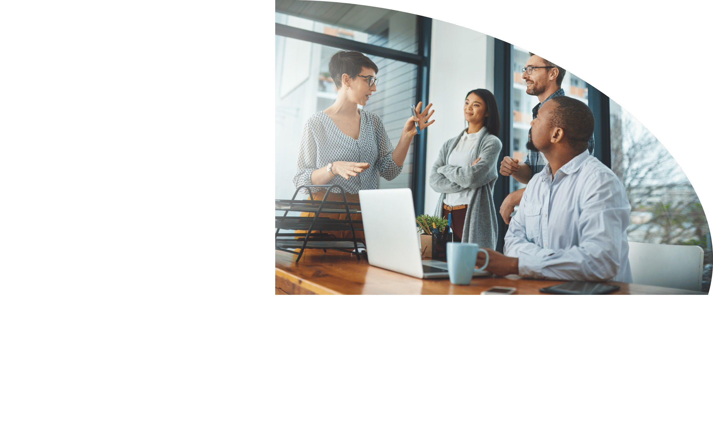 Cropped shot of a group of colleagues having a discussion in a modern office